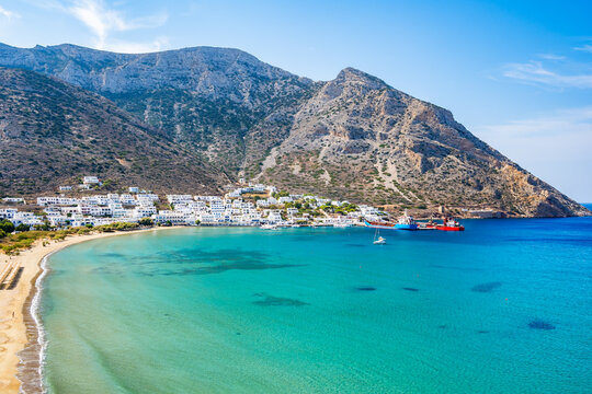 View of Kamares port sea bay and village in mountain landscape, Sifnos island, Greece