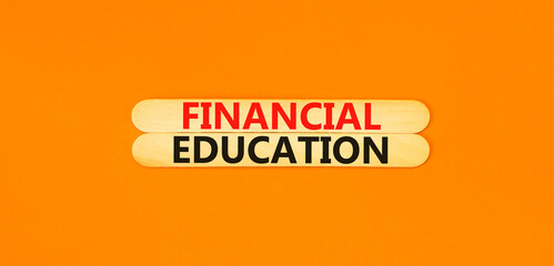 Financial education symbol. Concept words Financial education on beautiful wooden stick. Beautiful...