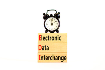 EDI electronic data interchange symbol. Concept words EDI electronic data interchange on blocks. Beautiful white background. Business and EDI electronic data interchange concept. Copy space.