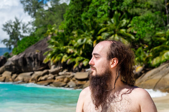 Portrait of a bearded swimmer on the beach
