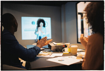 Happy listeners applauding to speaker