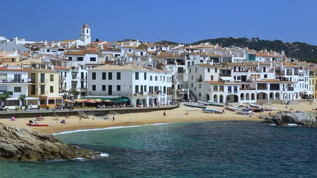 General view of the fishing village of Calella de Palafrugell and the beach of Port Bo. Costa Brava, Catalonia, Spain.