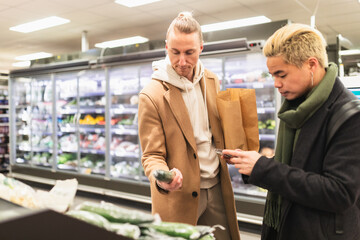 Couple buying food in supermarket