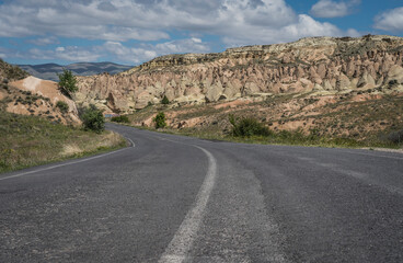 street and rock formation in cappadocia