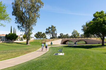 Walkers on Bike path in Park Scottsdale, Arizona in summer 