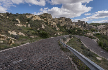 street and rock formation in cappadocia