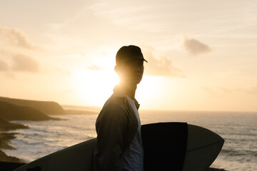 A skilled surfer is scouting for the perfect waves to surf