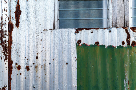 Textured pattern patchwork of rusty metal