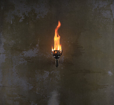 ancient torch on an old wall