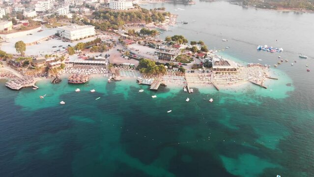 Amazing peninsula adorned with elegant hotels and beaches of azure Ionic sea of Ksamil beach Albania
