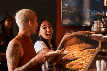 Pizza, friends and women joke with food at a restaurant with order and lunch with conversation. Customer, excited and happy people together with bonding and smile at a diner with meal and takeaway
