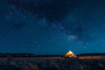The tent is under a starry night sky.