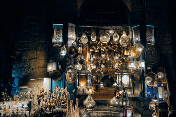 Glowing arabic lamps for sale in front of egyptian souvenir shop. Traditional middle eastern...