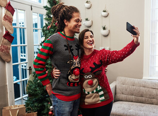 Couple, happy and selfie for Christmas, love and celebration or party in house together with smile....