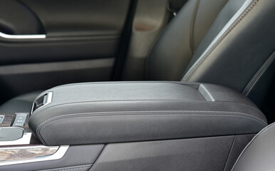 Armrest in the luxury passenger car, front seats