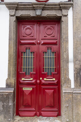 Red door on a building in Angra do Heroismo.