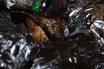Abstract texture. Aluminium foil. Crumpled glitter foil