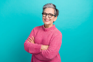 Photo of positive successful person dressed knitwear sweater in glasses holding arms crossed smile...