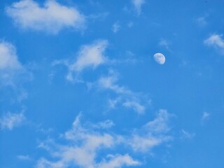 blue sky, moon in the sky