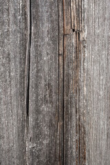 Old wooden weathered cracked panel. Rough texture or background