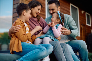 Cheerful family enjoying in their time together outdoors.