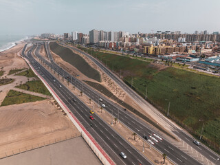 Viaduct of Avenida Escardot and descent to the Costa Verde highway in Lima. Panoramic view showing...