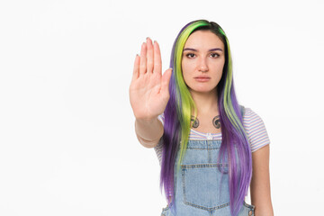 Young caucasian teenage girl woman hipster showing stop gesture sign with her palm isolated in white background. Forbidden, prohibited concept