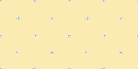 Vintage floral background. Seamless pattern for design and fashion prints on yellow background. Flowers pattern with small white and blue flowers. Ditsy style.