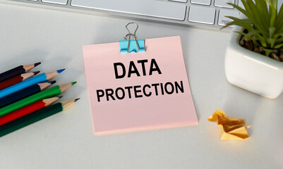 Data Protection phrase written on pink and white background. Law and justice concept.