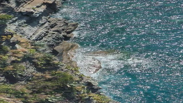 Waves crashing the rugged coastline