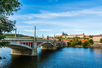 Prague, Czech Republic: Manes Bridge and the castle complex of Prague viewed from the banks of river Vltava