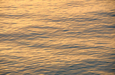 Setting sun illuminates stormy waves 1