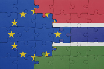 puzzle with the colourful national flag of gambia and flag of european union.