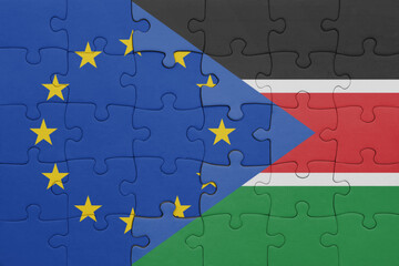 puzzle with the colourful national flag of south sudan and flag of european union.