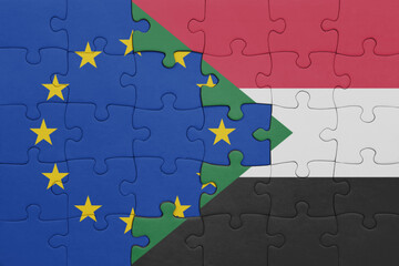 puzzle with the colourful national flag of sudan and flag of european union.