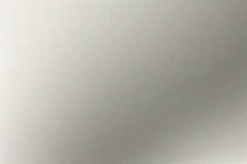 A tight shot of a polished metal surface adorned with a silver pattern, overlain by silver metallic foil
