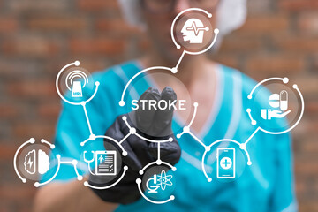Doctor working on virtual touch screen presses word: STROKE. Stroke medical concept. Stroke symptoms.