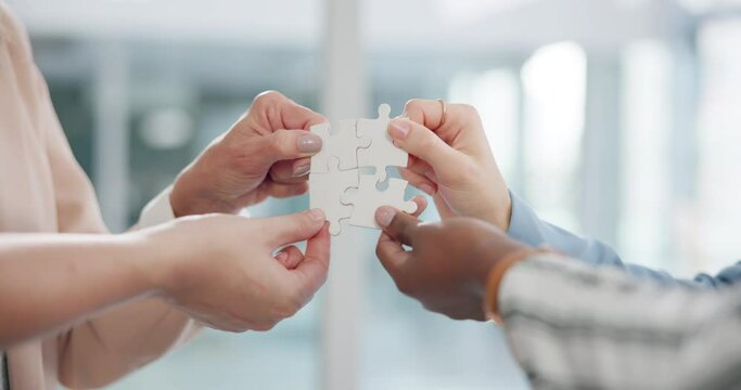 People, hands and puzzle for teamwork, collaboration and working together for business goal or challenge. Corporate group, team and jigsaw piece for synergy, cooperation and problem solving at office