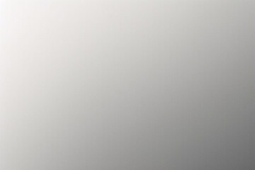 A tight shot of a polished metal surface adorned with a silver pattern, overlain by silver metallic foil
