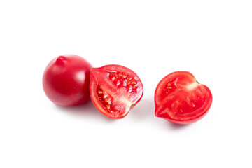 Whole and half of pink tomato isolated on white background.