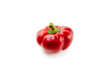 Whole red bell pepper isolated on white background with clipping path. .