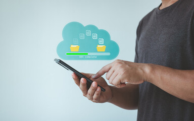 Data transfer, Transfer file of data between folder, Backup data, Exchange of files on cloud, Send of document in internet, DMS. Virtual document loading to another folder and hand holding smartphone