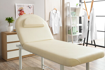 Interior of medical office with couch and door