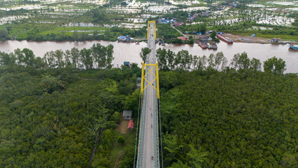 Fototapeta premium aerial view of the Barito Bridge located in South Kalimantan, Indonesia