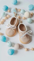 Baby shoes and teethers. Organic newborn accessories. copy space