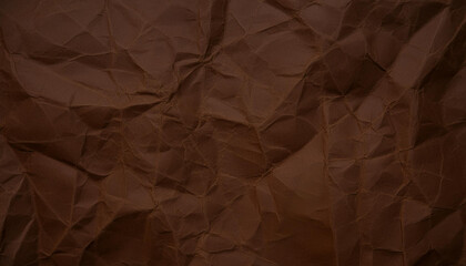 Crinkled dark brown paper texture background