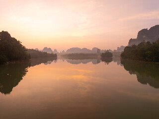 Sunset or sunrise light over lake or pond,Amazing landscape colorful sky background