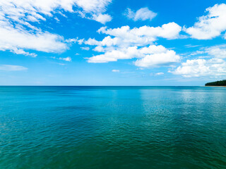 Aerial view of a blue sea surface water texture background,Sun reflections over ocean, Aerial...