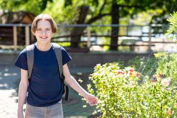 Portrait of an 11 year old boy in the park