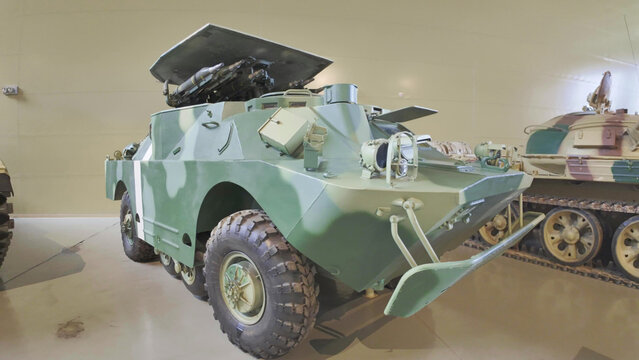 Royal Tank Museum, Amman, Jordan - May 4, 2024: Soviet-era BRDM-2 amphibious armored car exhibited at the Royal Tank Museum in Jordan amidst other historical military vehicles